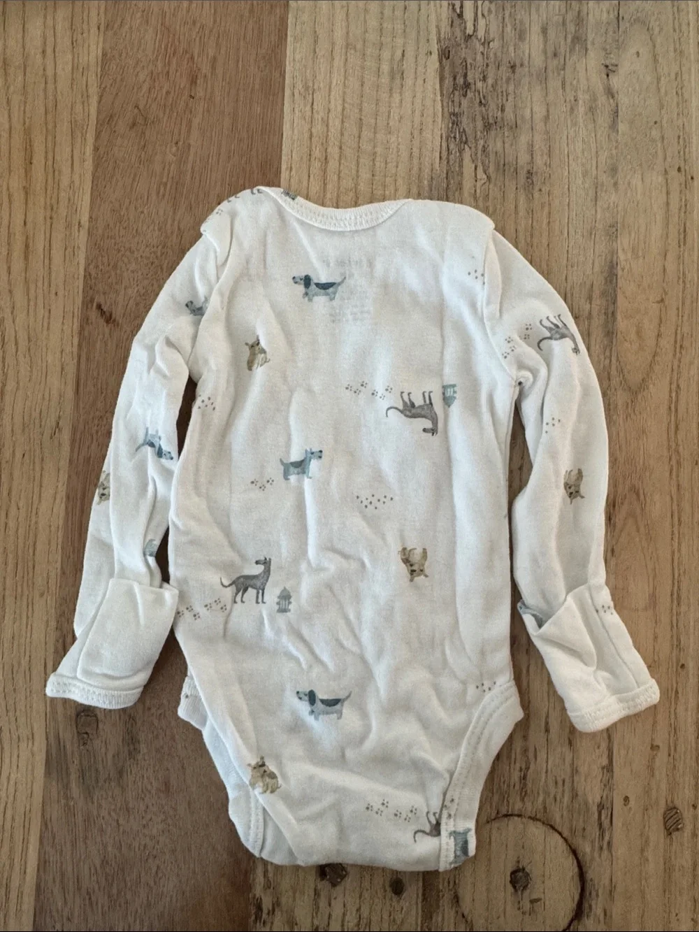Carter's Cream Long-Sleeve Bodysuit with Blue and Tan Animal Prints